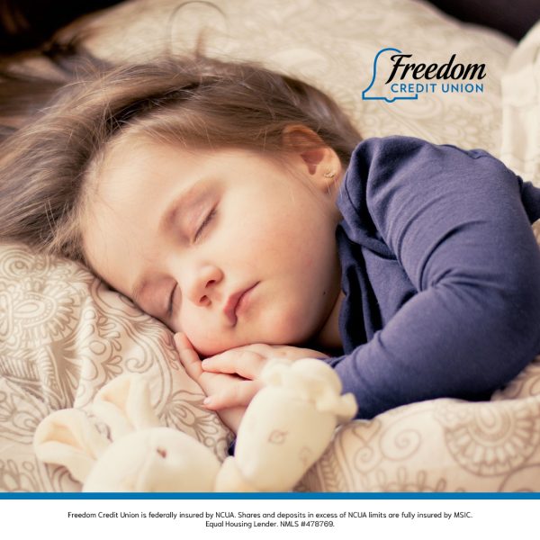 Child sleeping in bed