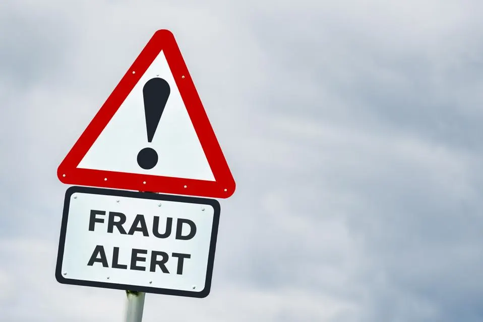 triangle sign outlined in red with an exclamation point