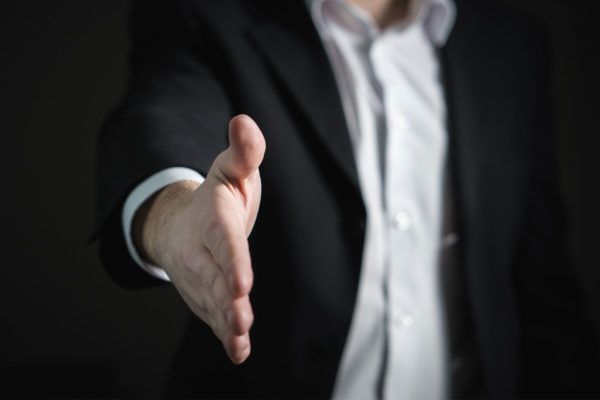 man ready for a business deal handshake