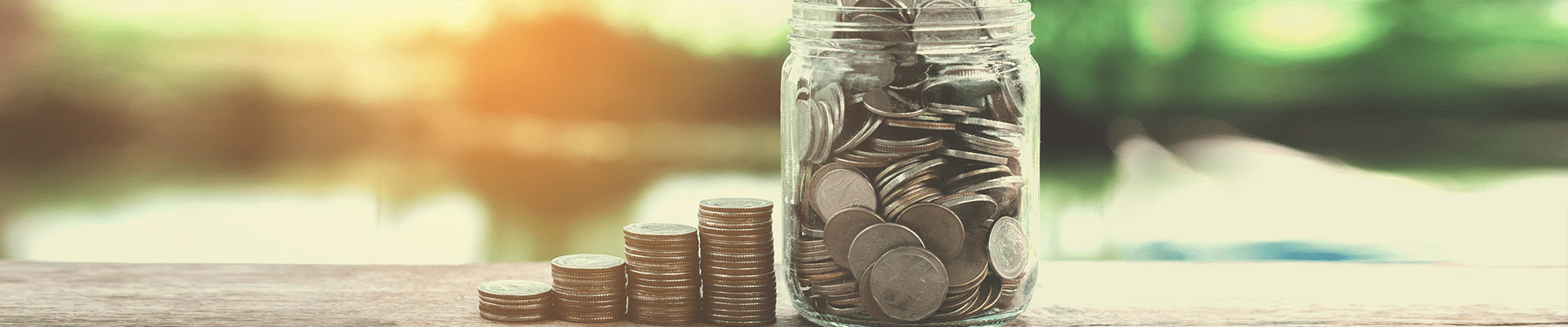 money jar and coins